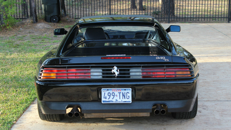 Illustration for article titled Holy Hell, This Gorgeous Black Ferrari Is The Price Of A Used Mustang